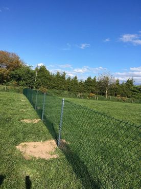 Chainlink field around a fence